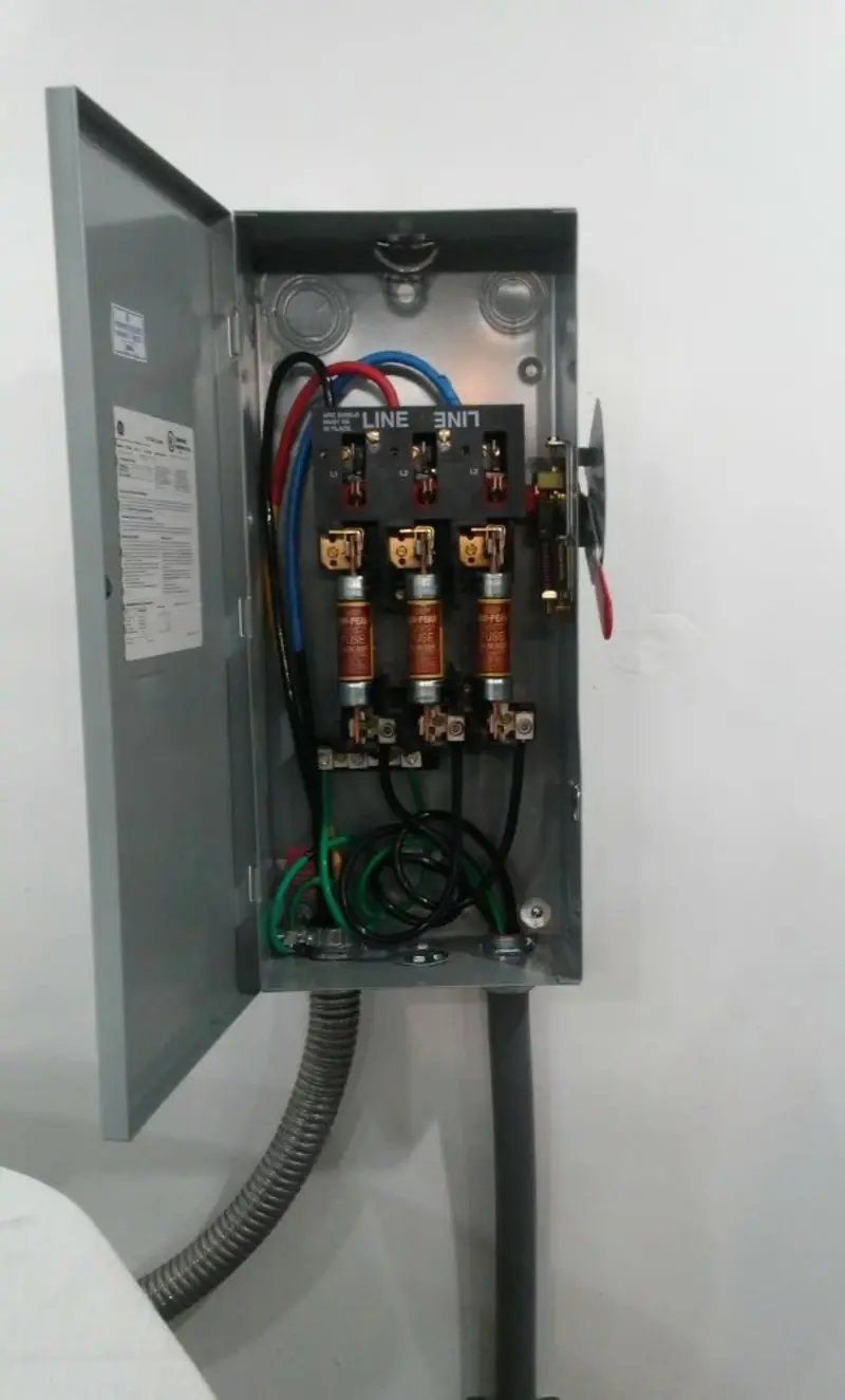 Three-phase disconnect switch installed for Smoke Detector Installation in Spring Lake Park