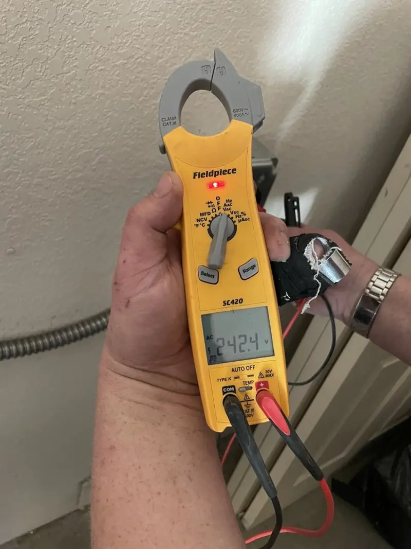 Voltage testing with clamp meter during Generator Installation in Spring Lake Park